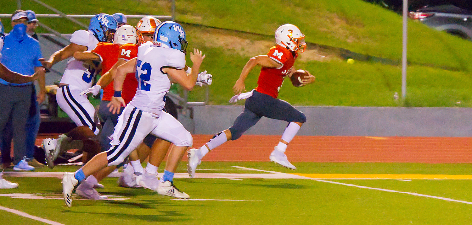 T.J. Moreland of Mineola sprints for daylight and a score after recovering a West Rusk fumble in Friday’s 36-14 Mineola victory. (Monitor photo by Sam Major)